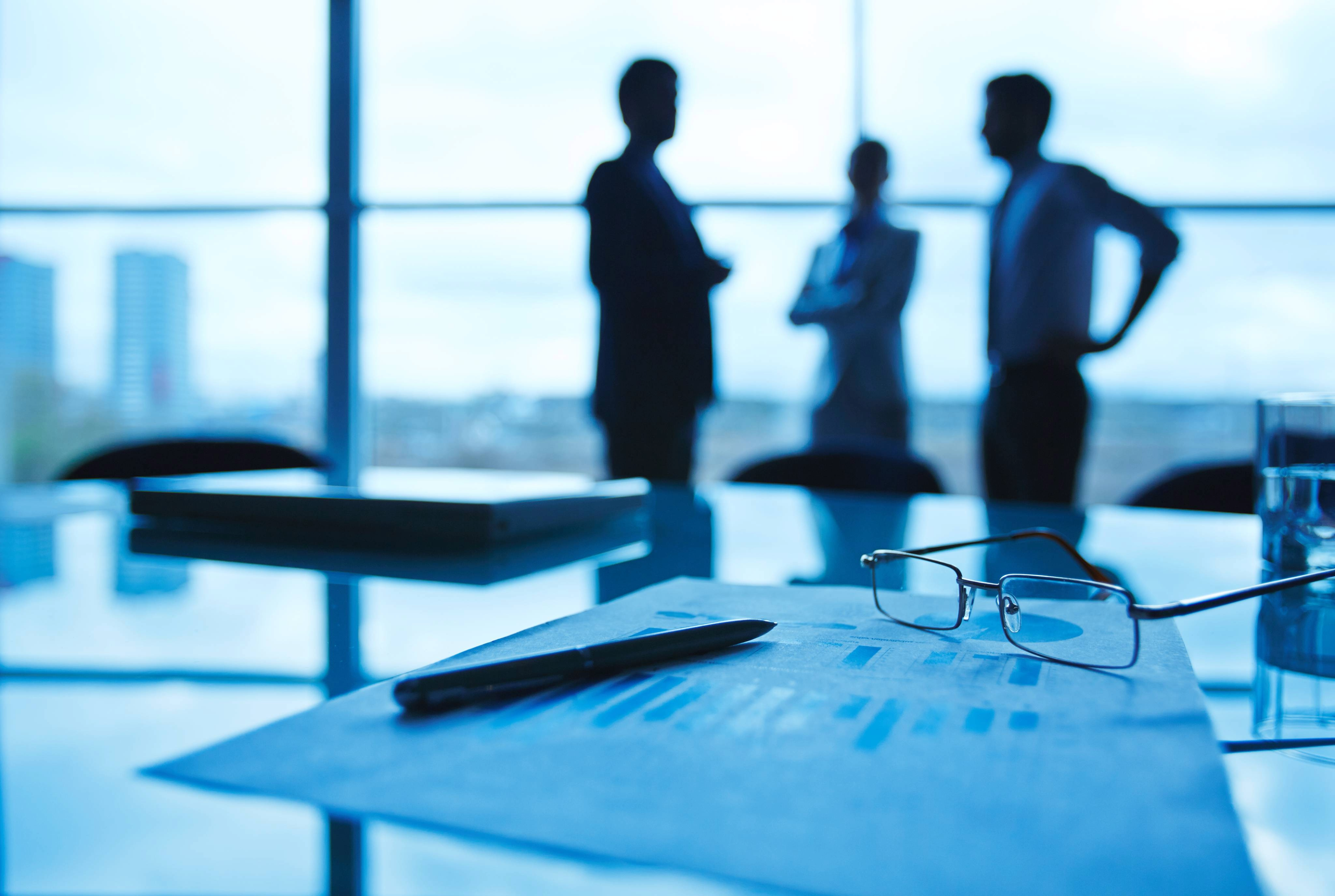 Financial reporting documents with charts and ledger data